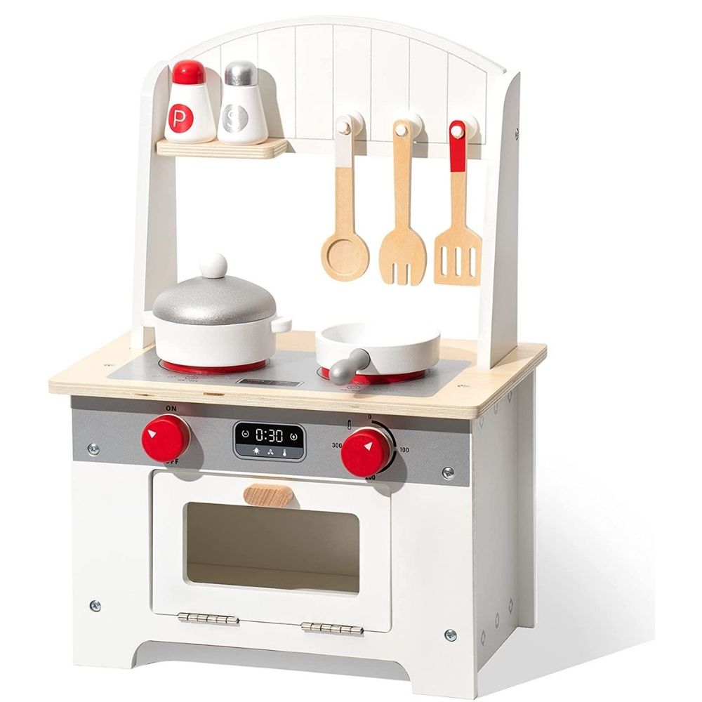 A wooden toddler toy kitchen with utensils and pans